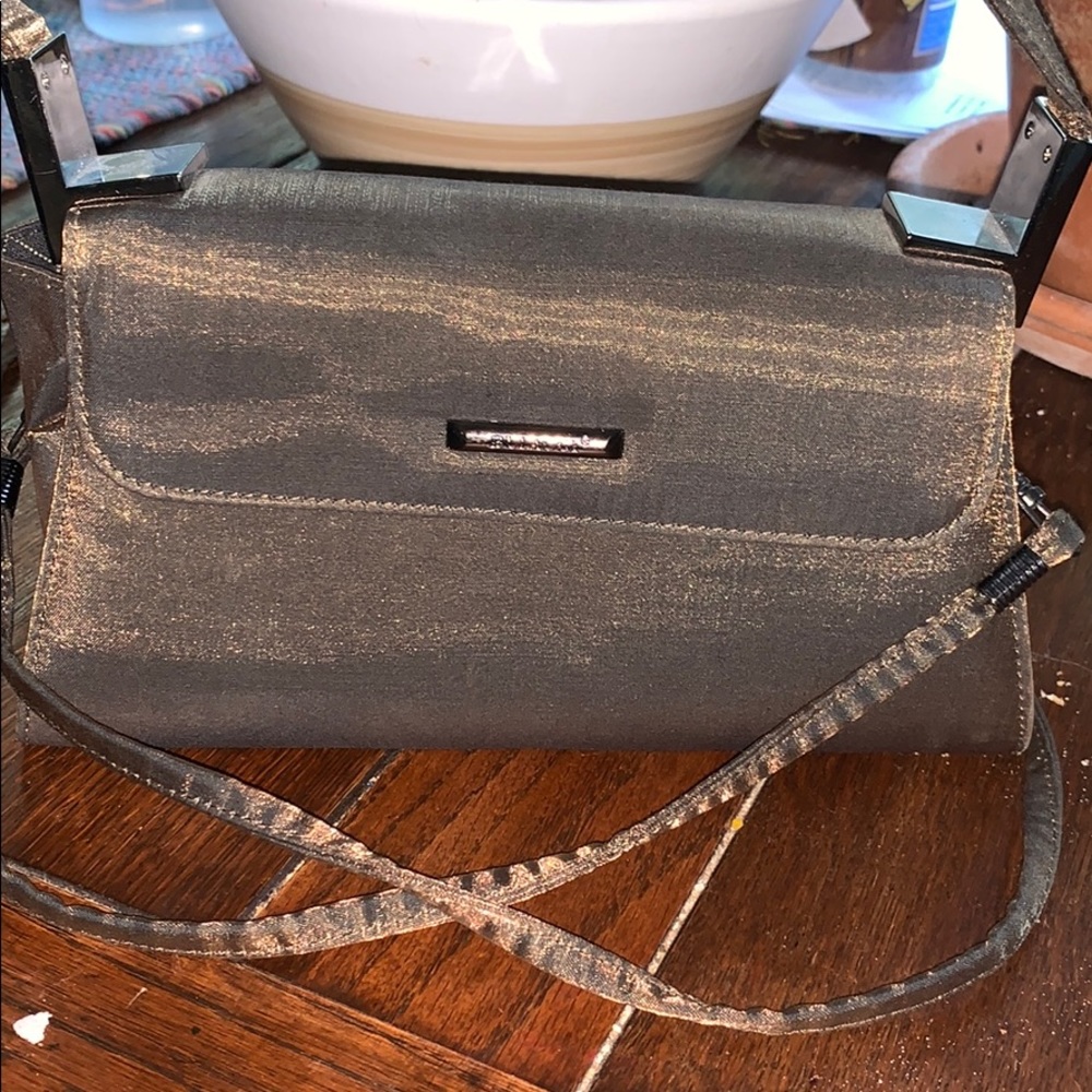 Bulaggi hand clutch and/or purse.